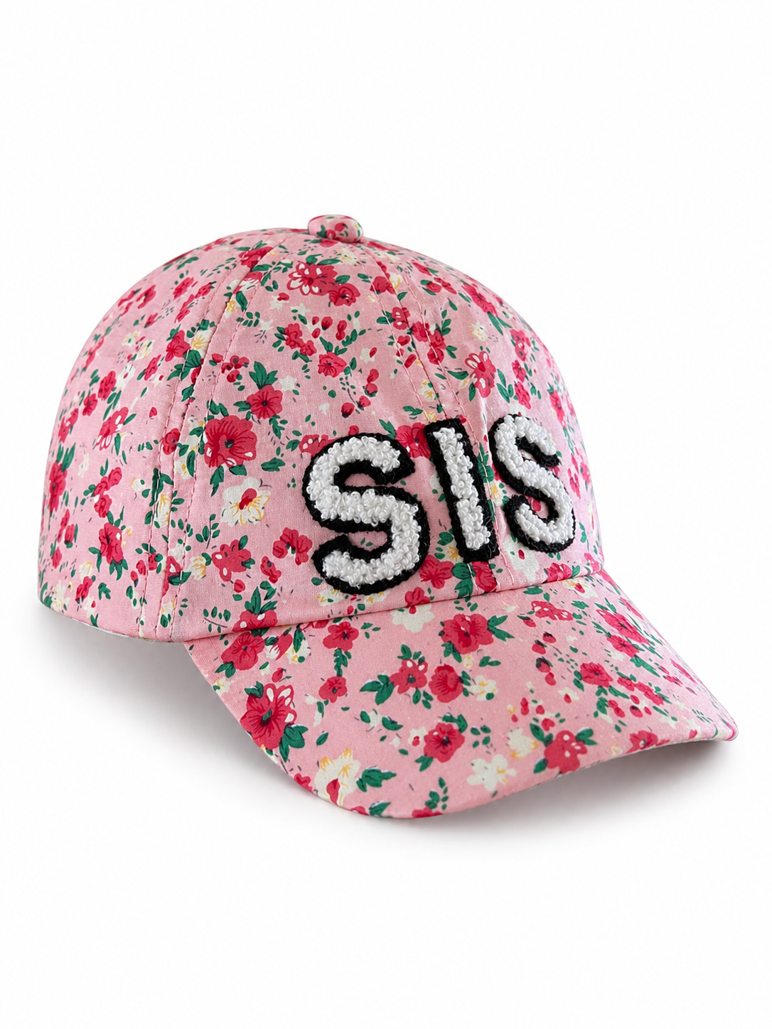 Pink floral cap with "SIS" embroidered on the front, featuring a curved brim and vibrant flower patterns.