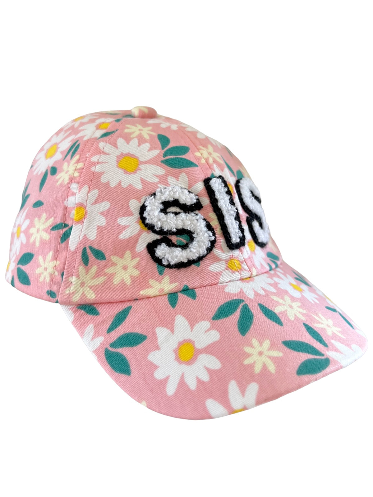 Pink floral cap with "SIS" stitched on the front in black and white, featuring daisies and green leaves.