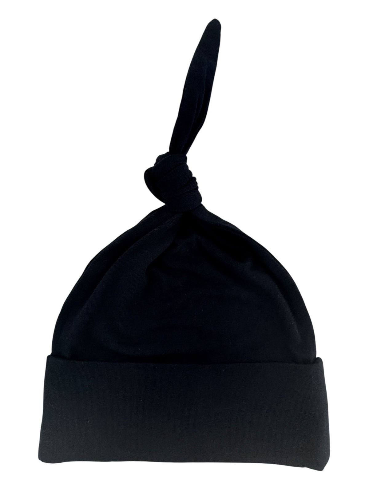 Black beanie hat with a knot on top and a folded hem. Ideal for stylish warmth and comfort.