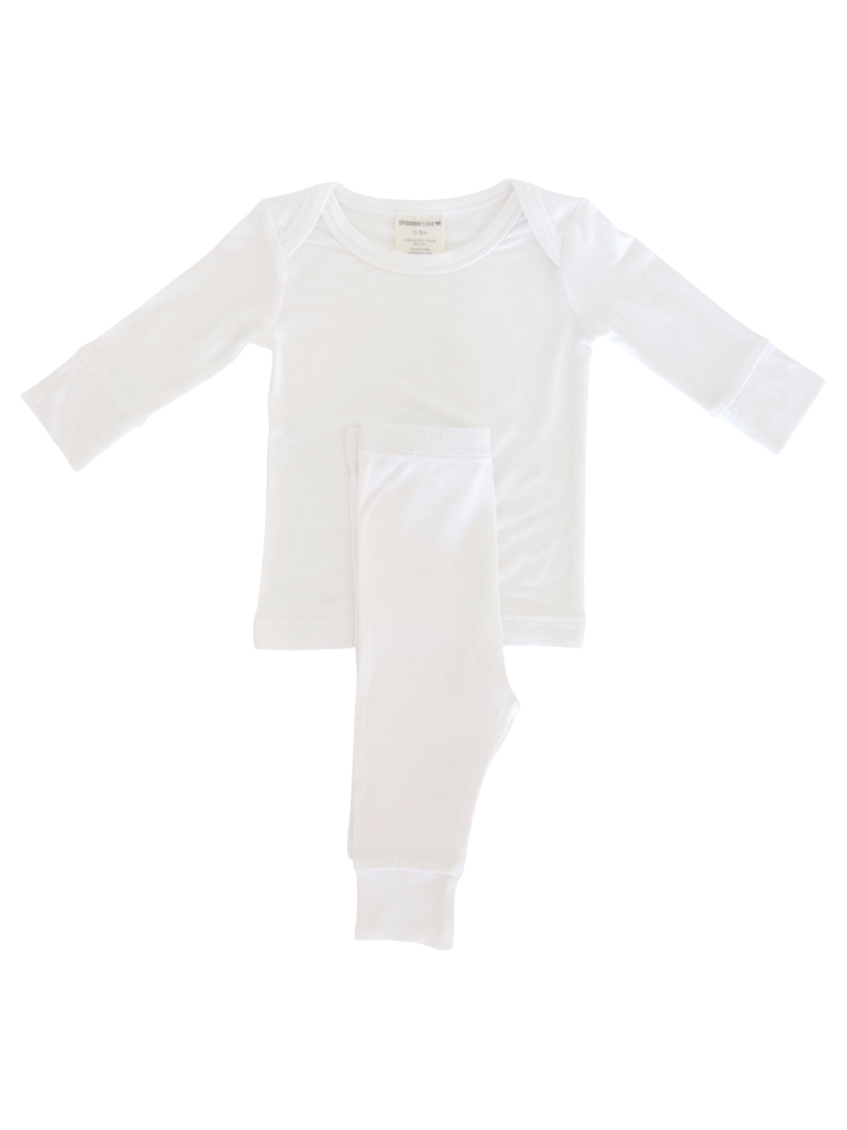 White long-sleeve top and matching pants set laid flat on a light background.