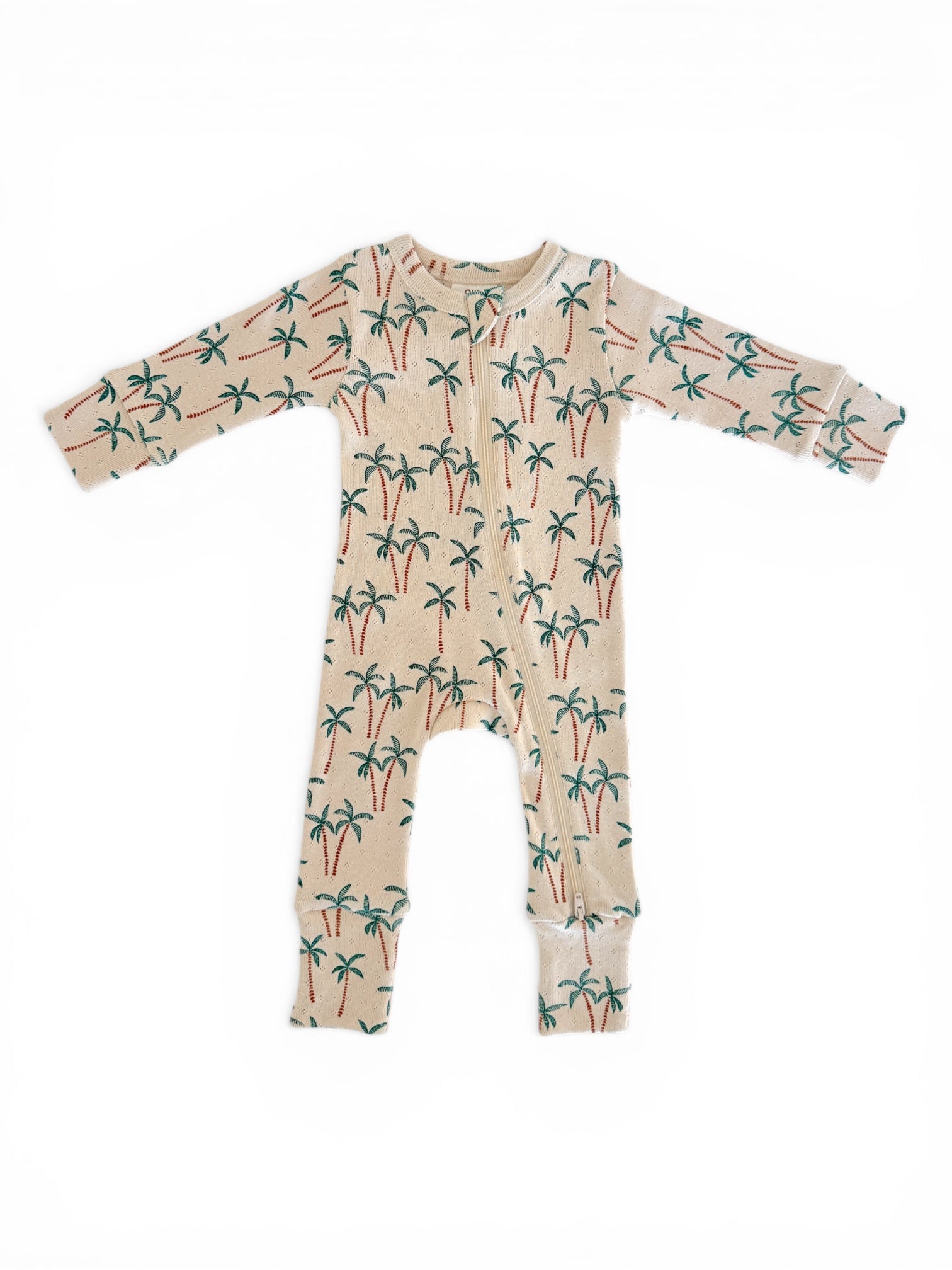 Beige baby onesie with palm tree print, featuring long sleeves and a front zipper closure.