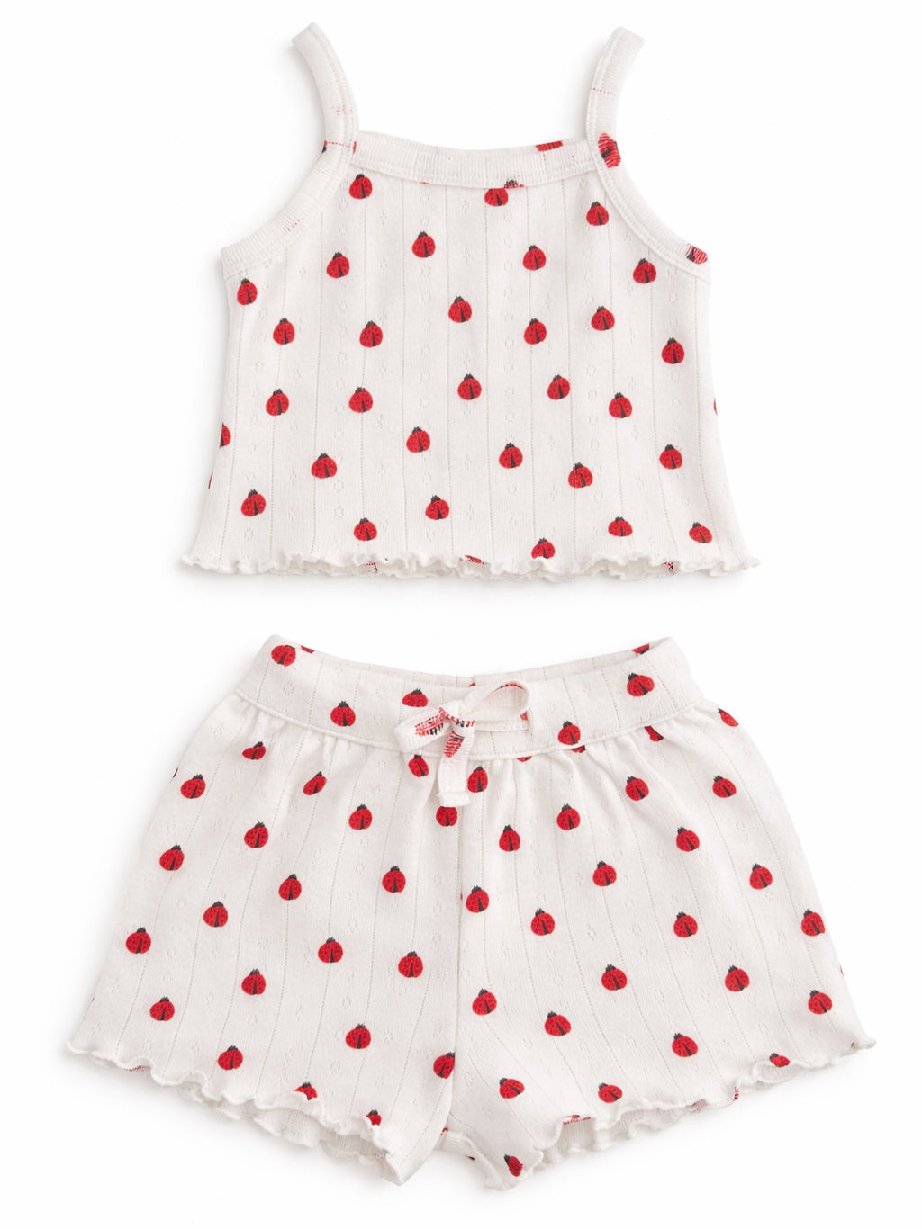 Red polka dot tank top and shorts set on a white background. Lightweight and perfect for warm weather.