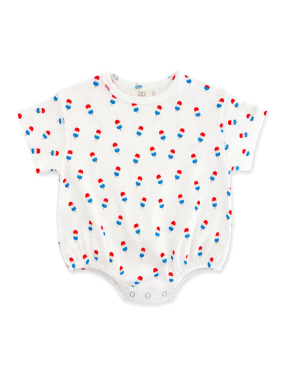 Children's white onesie with red and blue ice cream cone patterns throughout. Short sleeves and snap closure at the bottom.