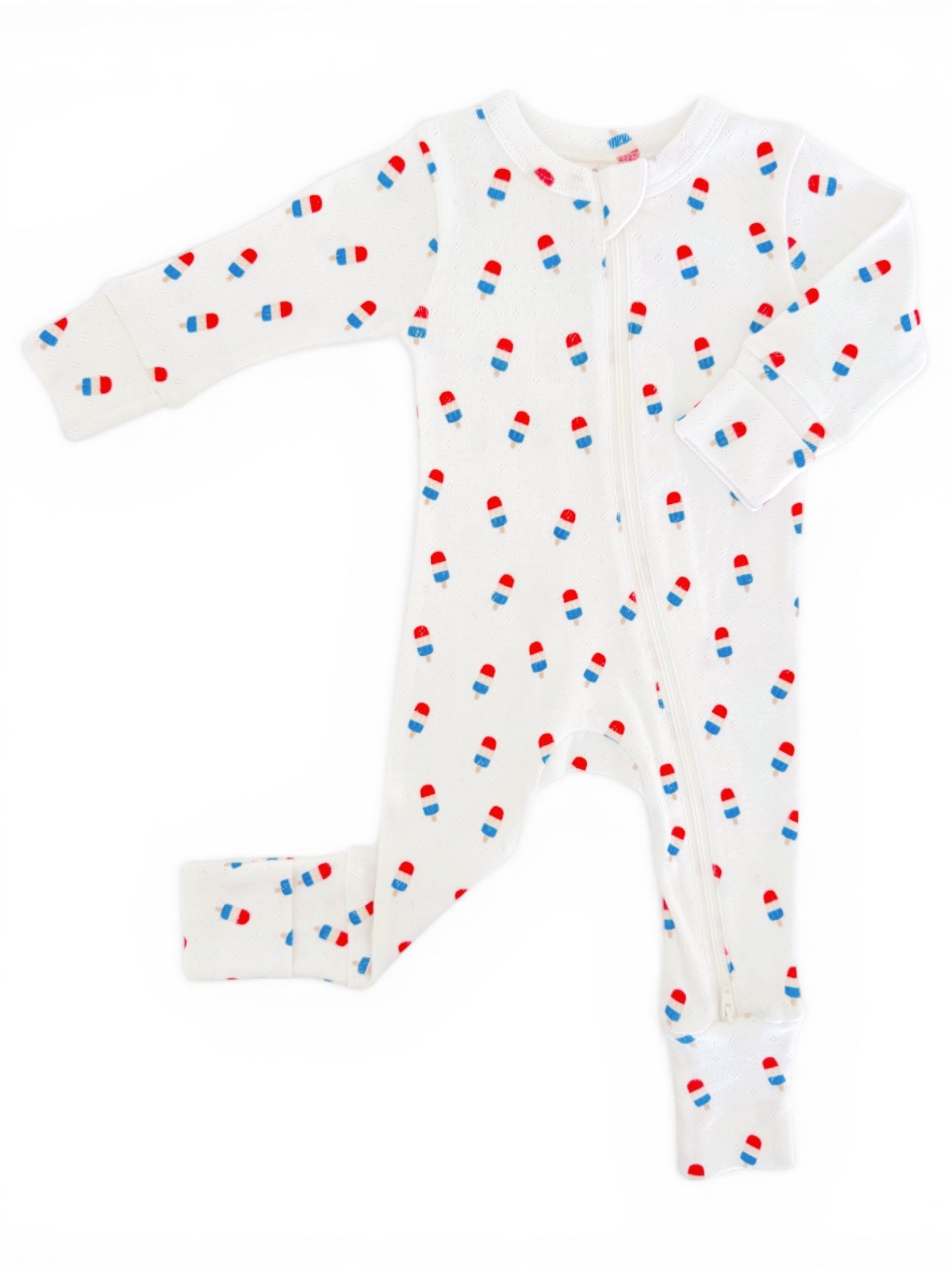 White baby onesie with colorful popsicle patterns, featuring long sleeves and a front zipper.