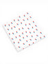 White fabric with a repeating pattern of blue and red ice cream cones.