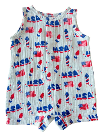 Children's romper with a festive print featuring USA flags and rockets in red, white, and blue colors.