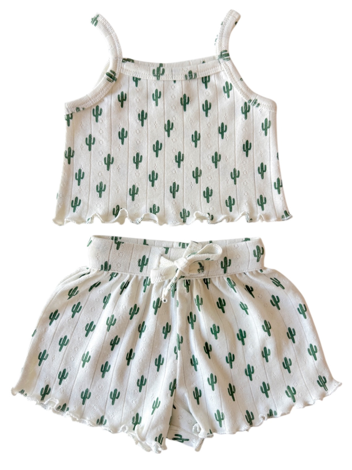 Cactus-patterned kids' two-piece pajama set featuring a spaghetti strap top and matching shorts.