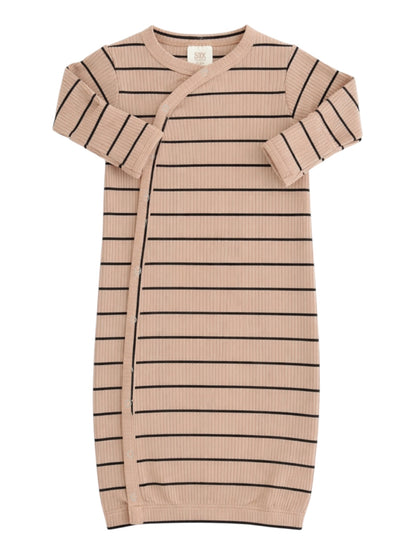 Light pink ribbed baby dress with black stripes and a side snap closure. Ideal for infants and toddlers.