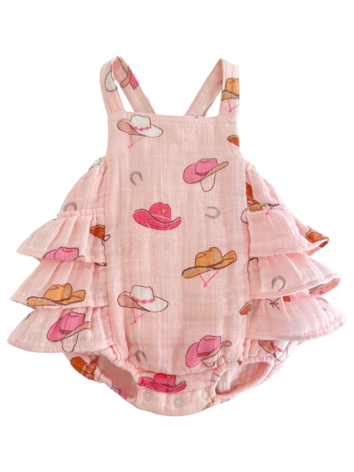Pink ruffled baby romper with a cowboy hat print, perfect for playful summer outfits.