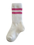White sock with pink stripes, featuring a ribbed top for comfort and style. Ideal for casual wear.