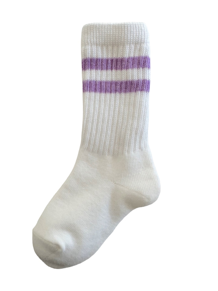 White socks with purple stripes, featuring ribbed texture and a crew style design.
