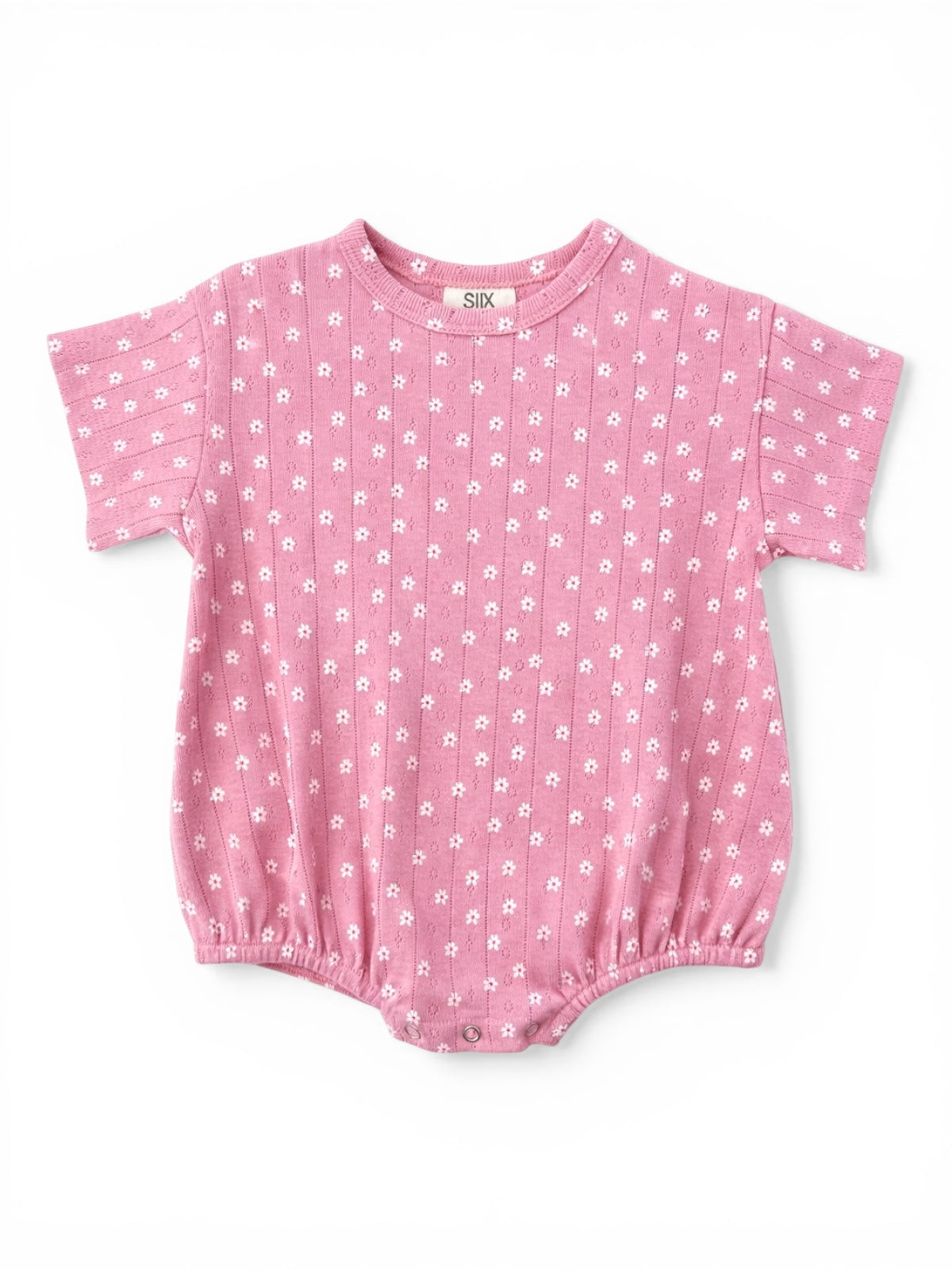 Pink floral baby romper with short sleeves and elasticized leg openings. Casual and comfortable infant clothing.