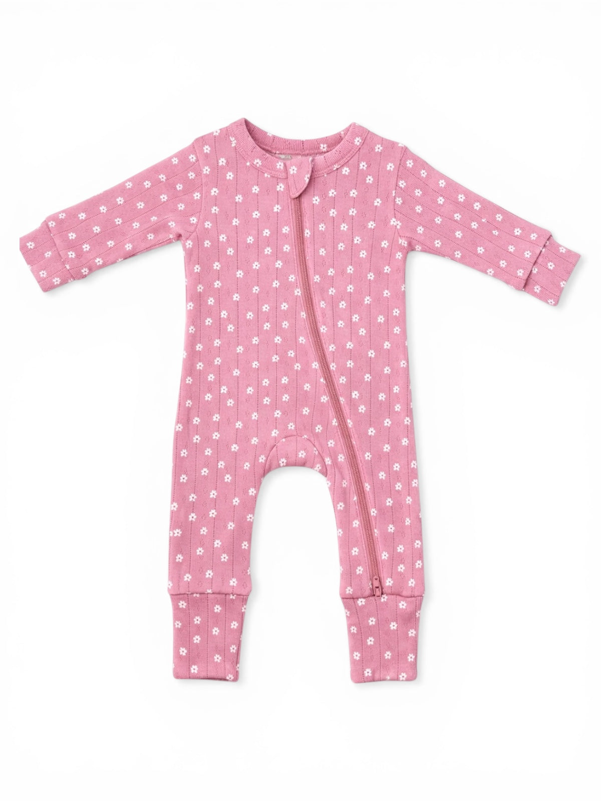 Light pink baby onesie with white floral pattern and a front zipper. Long sleeves and footed design.