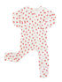 White baby onesie with red strawberry print and long sleeves.