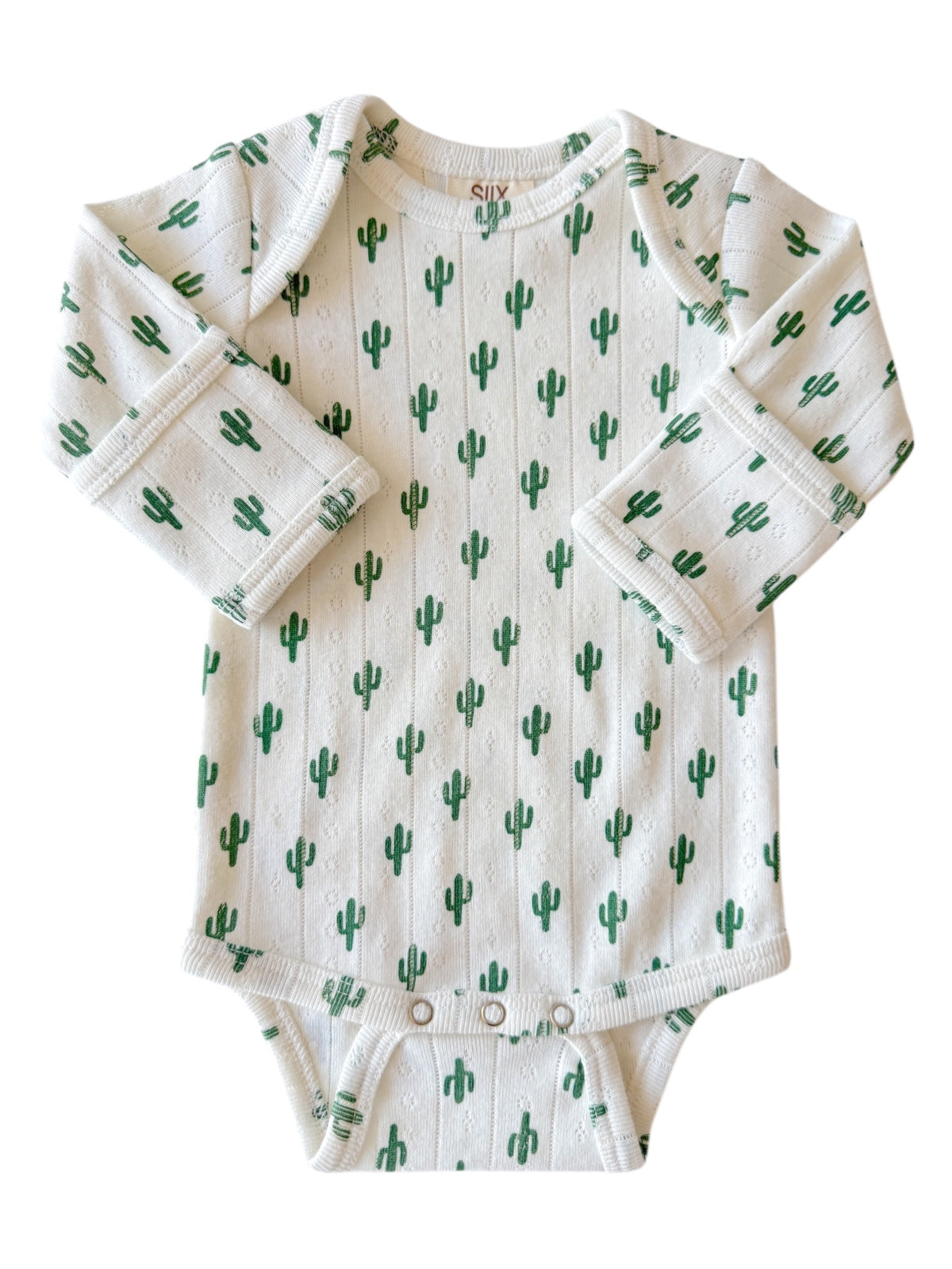 White baby onesie with a cactus pattern in green. Soft fabric and long sleeves. Suitable for infants.