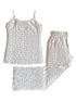 White tank top and matching pants with navy blue star print, laid flat on a white background.