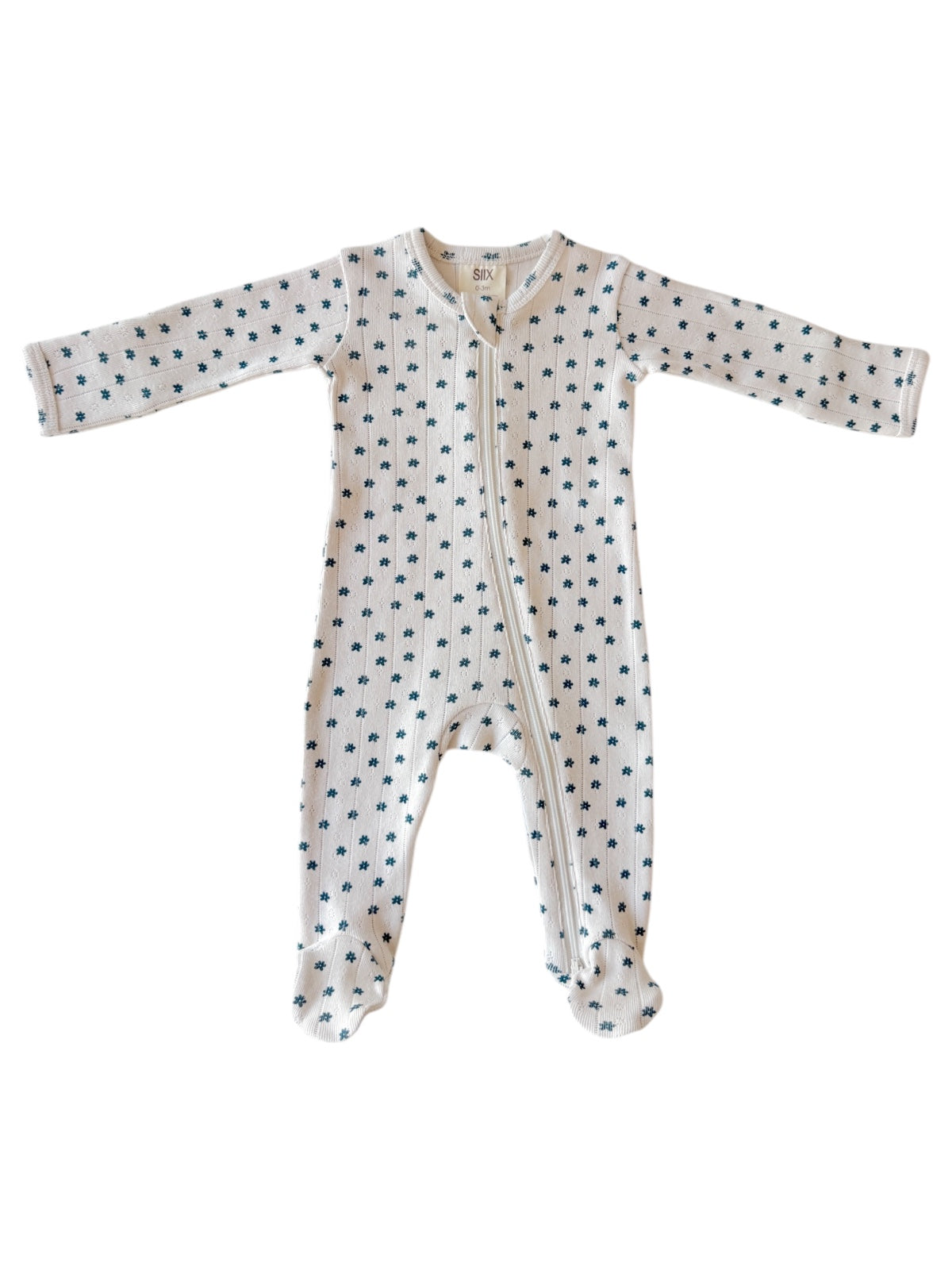 White toddler onesie with blue flower patterns and long sleeves, featuring a front zipper closure.