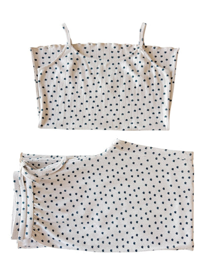 Cotton sleep set featuring a sleeveless top and matching shorts, both with a star pattern on a cream background.
