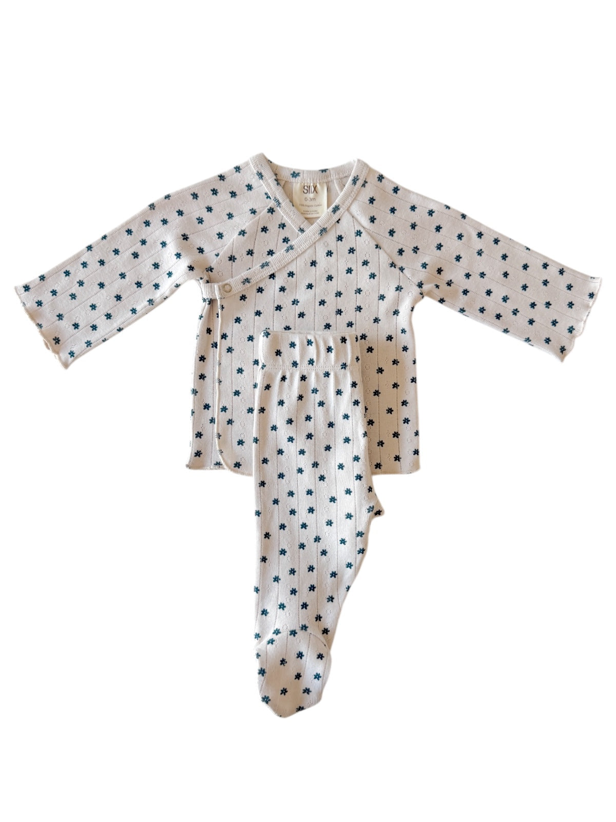 White baby outfit with long sleeves, featuring a floral pattern in blue. Includes matching pants and footies.