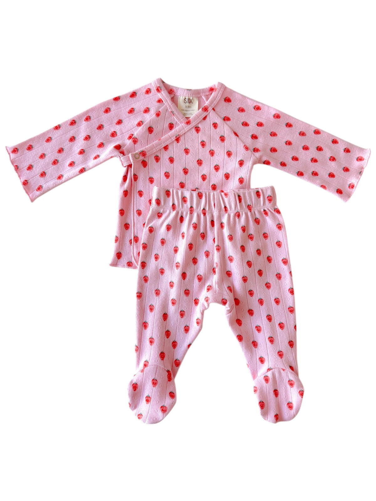 Pink infant outfit featuring long sleeves and pants with a strawberry print. Soft, comfortable fabric for babies.
