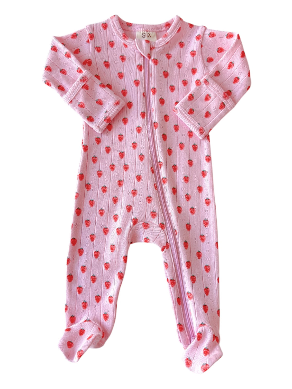 Pink baby onesie with strawberry print and long sleeves, featuring a front zipper.