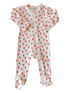 White baby onesie with red strawberry prints, featuring long sleeves and front zipper closure.