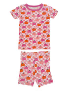 Pink pajamas with colorful pumpkin patterns, featuring a short-sleeve top and matching shorts.