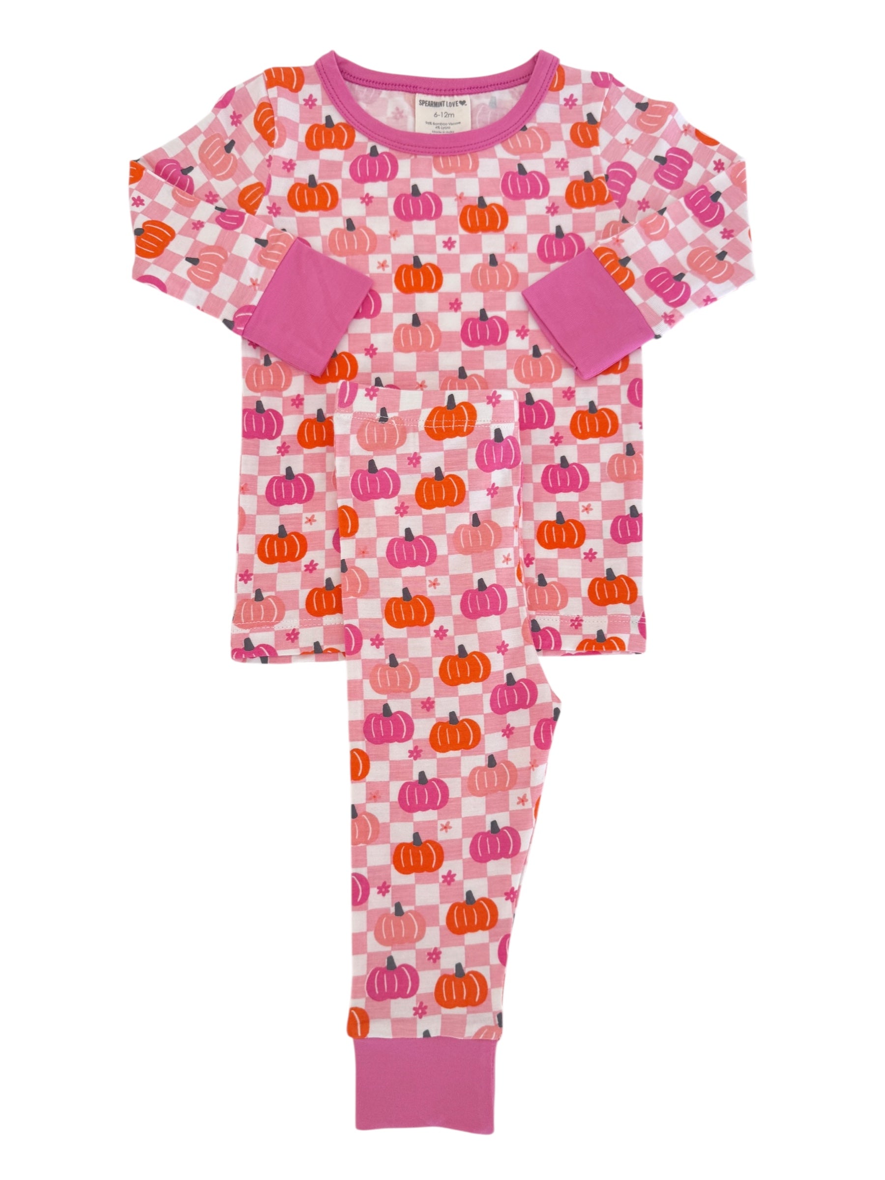 Pink pajama set with pumpkin patterns, featuring long sleeves and matching pants. Ideal for cozy and festive nights.