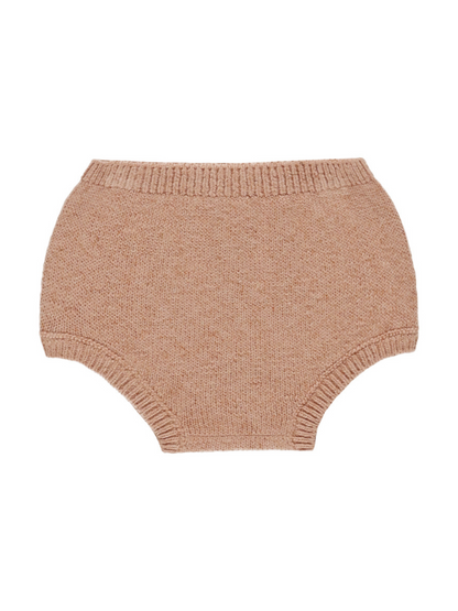 Knit baby bloomers in soft beige with a ribbed waistband and leg openings.