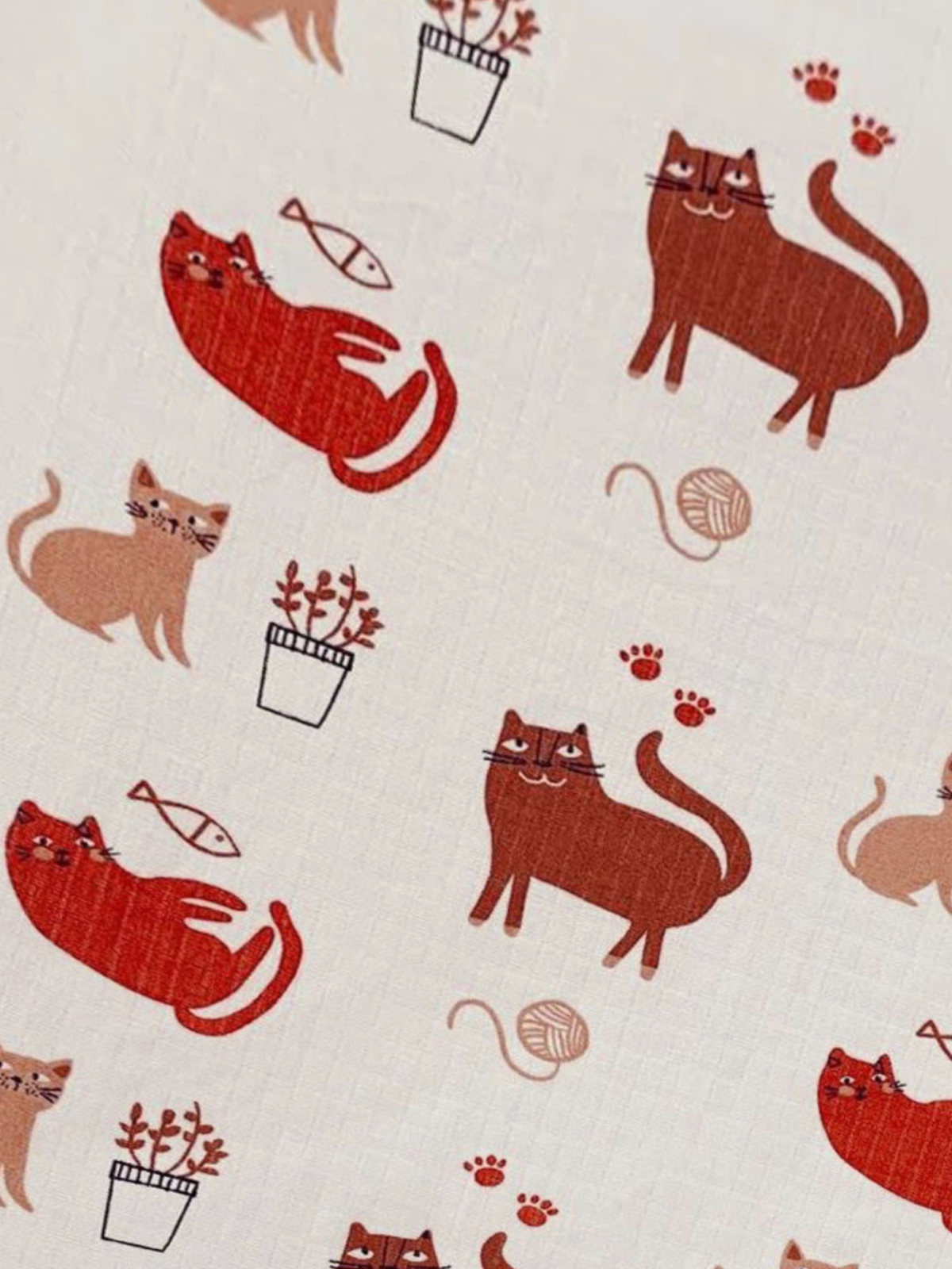 Pattern of various cartoon cats, fish, plants, and yarn on a light background.