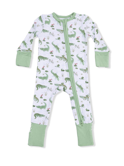 Green and white baby sleeper adorned with crocodile and lily pad patterns. Ideal for comfortable play and sleep.
