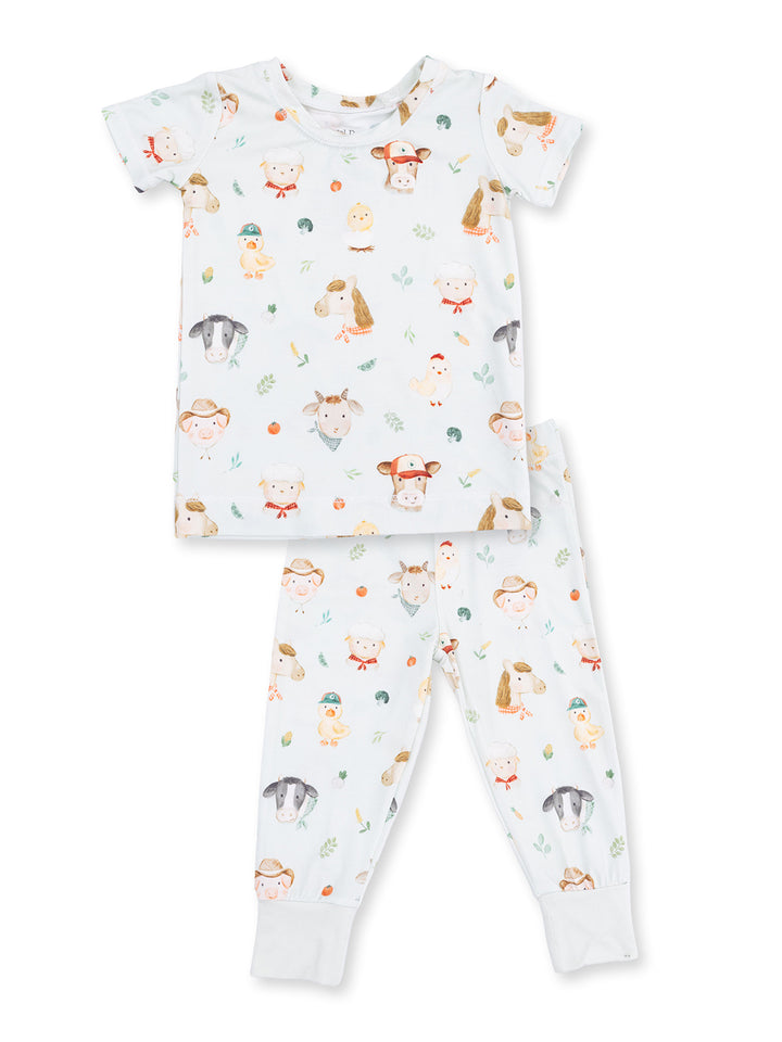 Child's pajamas featuring cute animal illustrations on a light background. Soft, comfy fabric for sleepwear.
