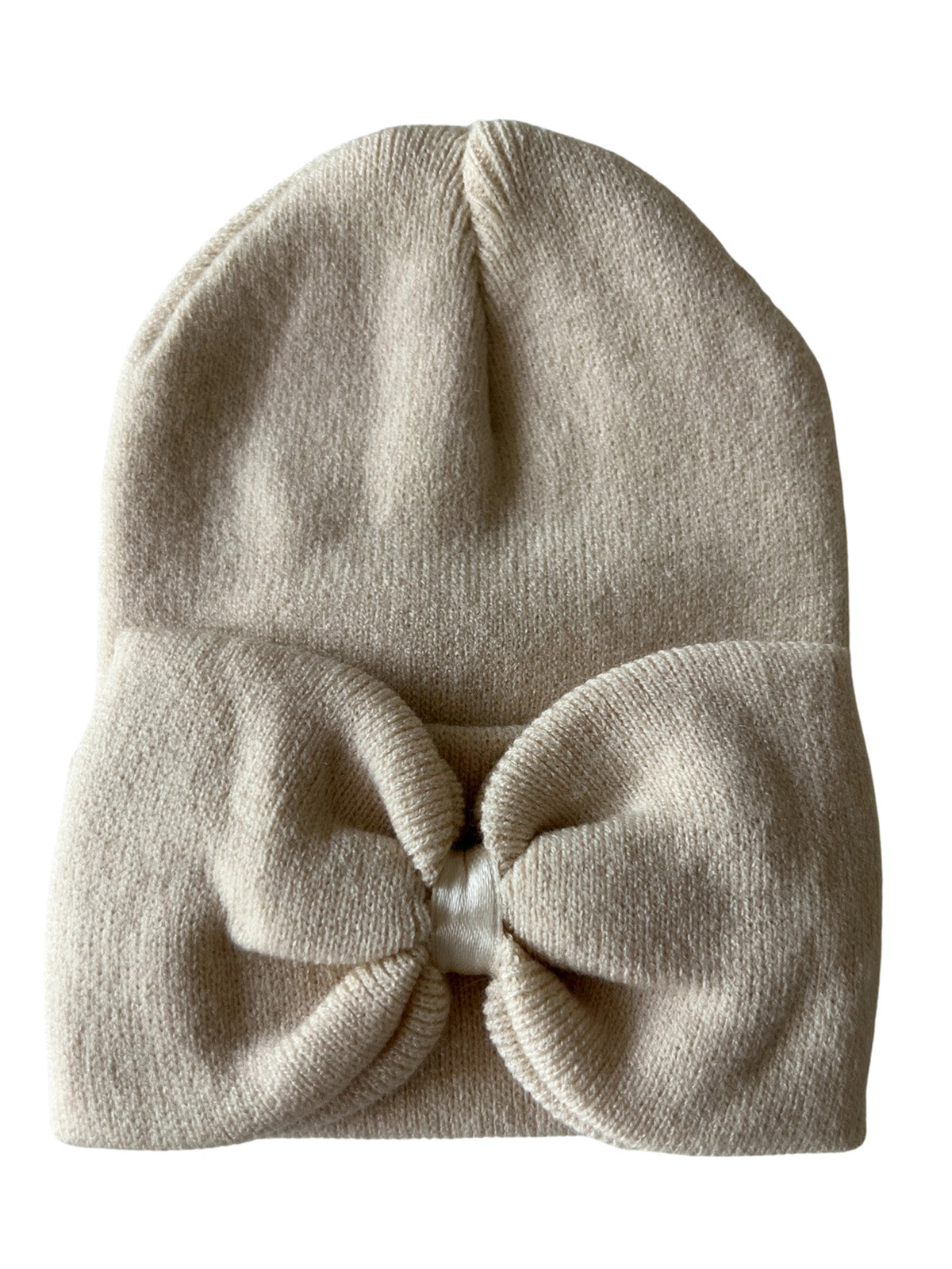 Cream-colored knit beanie with a bow detail at the front.