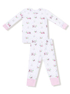 White pajama set with golf-themed prints, featuring long sleeves and striped cuffs. Perfect for kids' bedtime.