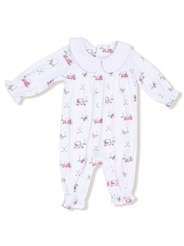 White baby romper with golf cart and equipment print, featuring a large collar and elasticized ankle cuffs.