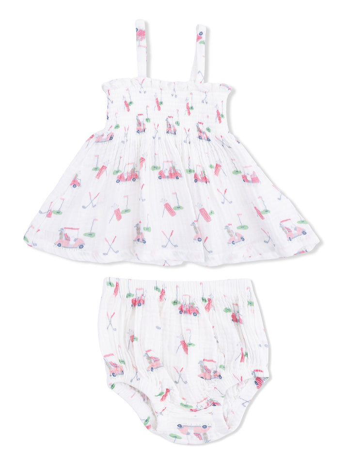 Girls' dress and bloomers set with playful golf-themed prints in pastel colors. Adjustable straps and soft fabric.