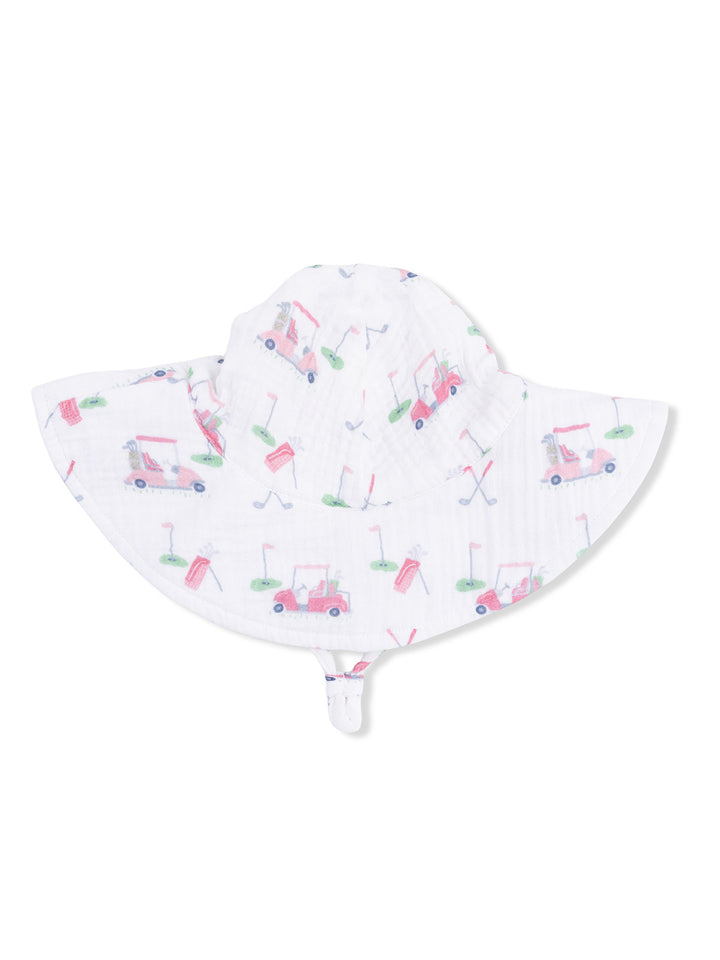 White sun hat with golf-themed patterns, including golf carts, clubs, and flags. Perfect for sunny days on the course.