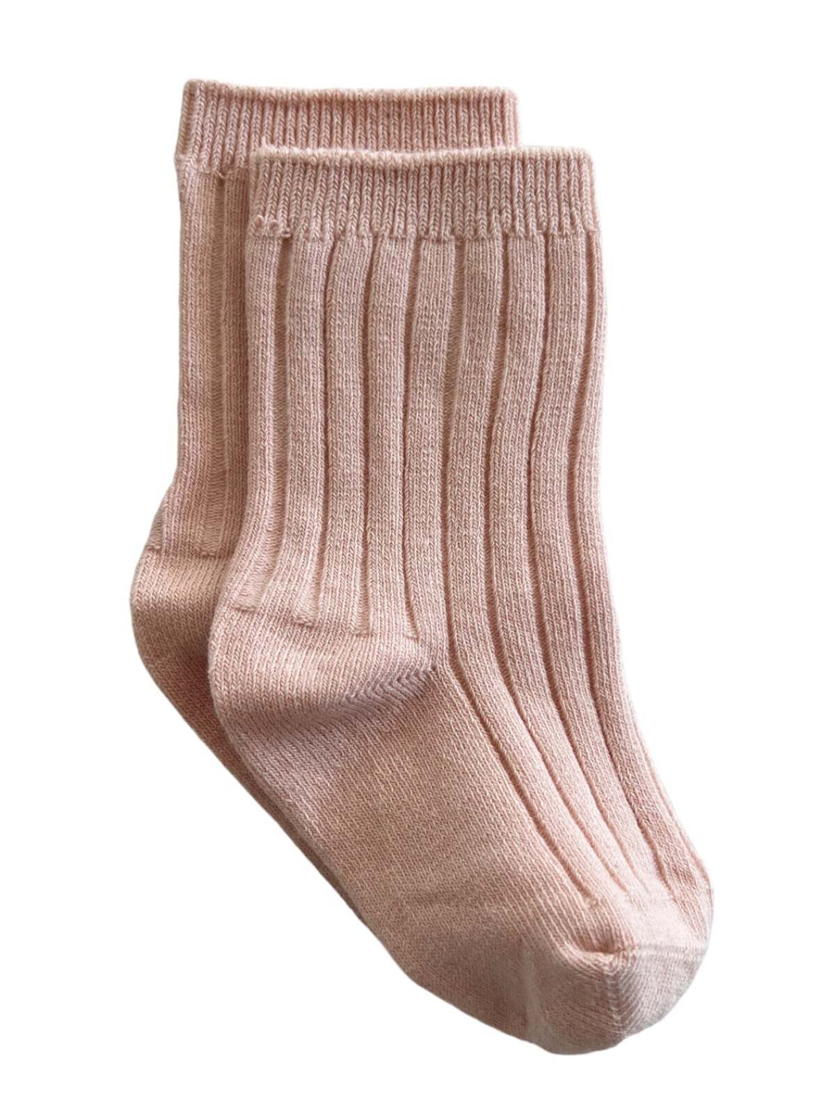 Pink ribbed socks stacked neatly, featuring a comfortable fit and soft texture. Ideal for everyday wear.