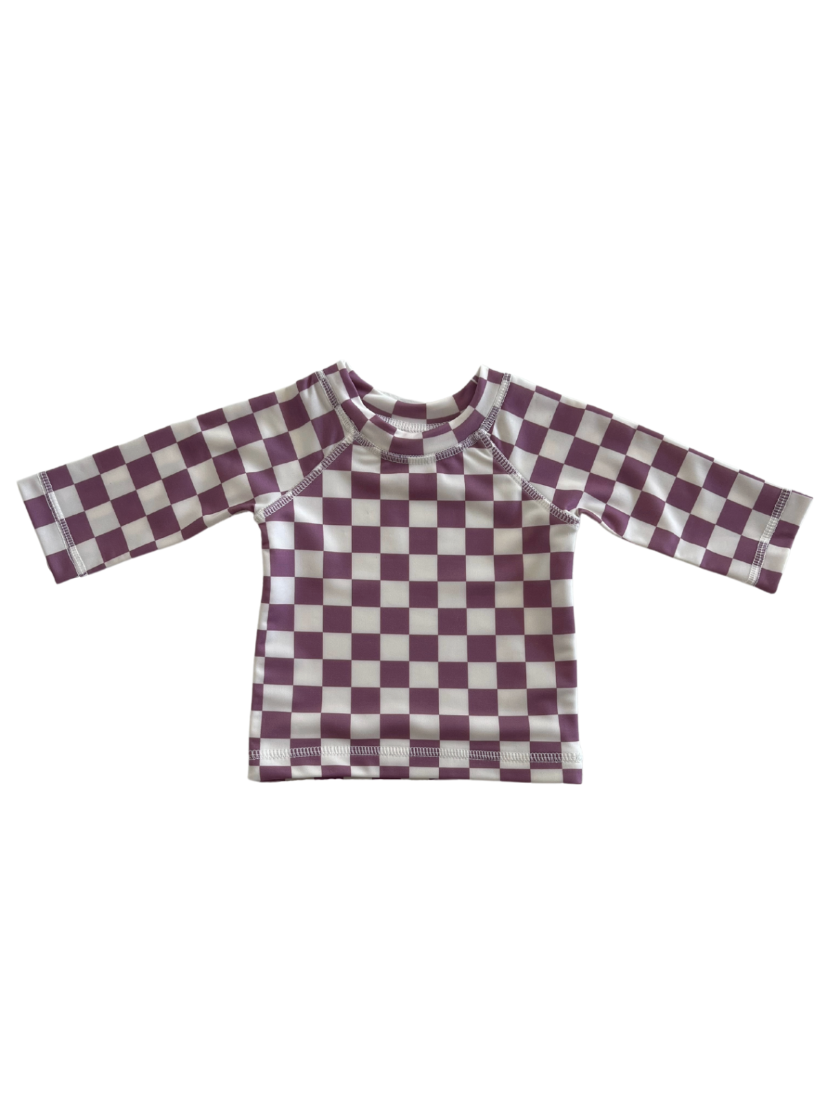 Child's long-sleeve rash guard featuring a purple and white checkerboard pattern. Ideal for sun protection.
