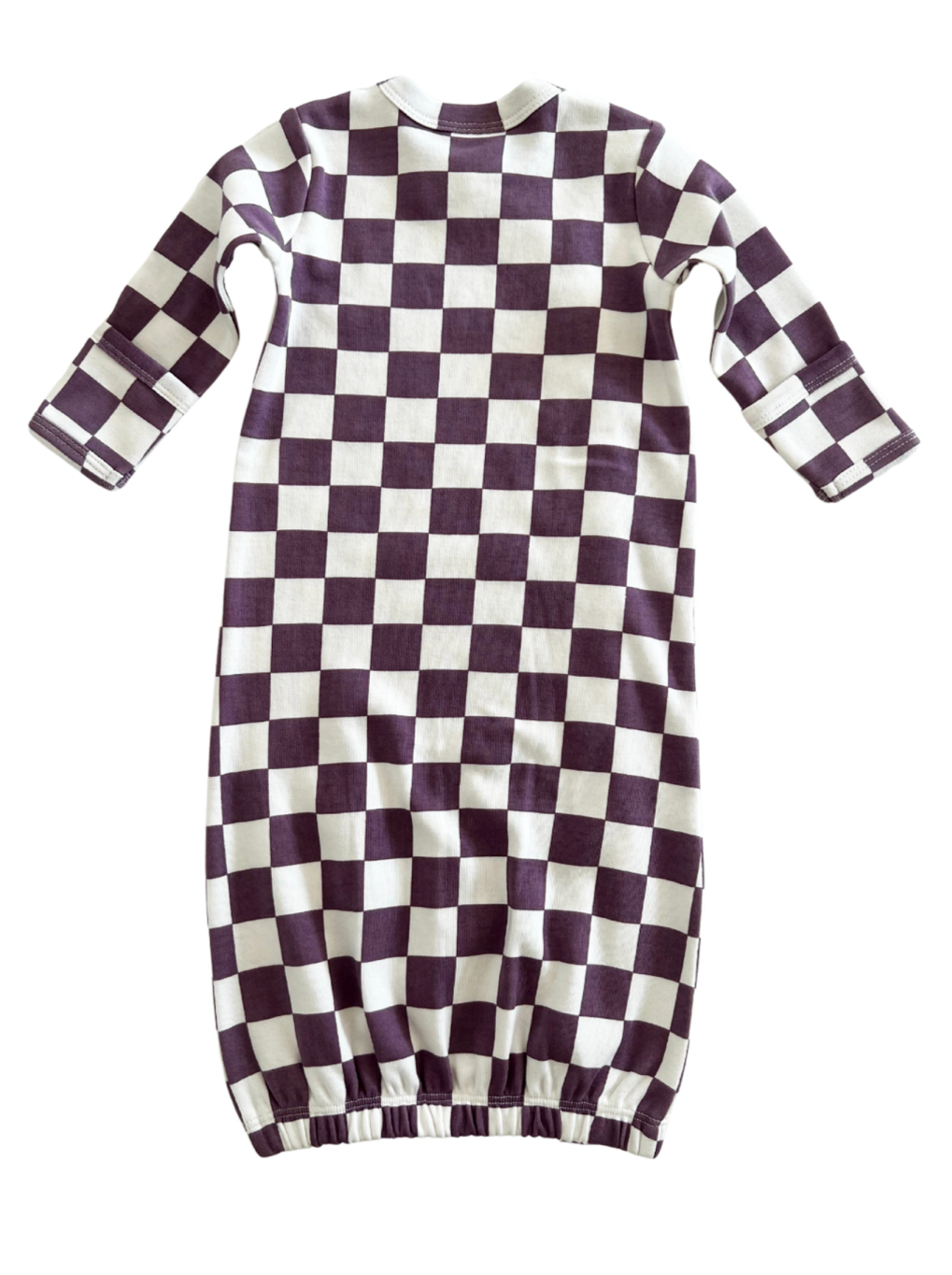 Purple and white checkered long-sleeve dress with a gathered hem.