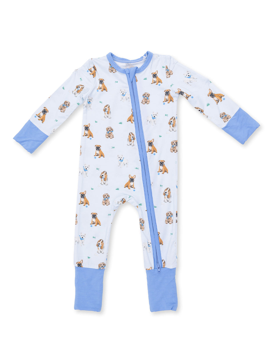 Blue dog-patterned onesie with long sleeves and zipper closure, perfect for kids' sleepwear.