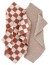 Two textured throws: one with a rust and white checkered pattern, and the other in a solid beige knit.