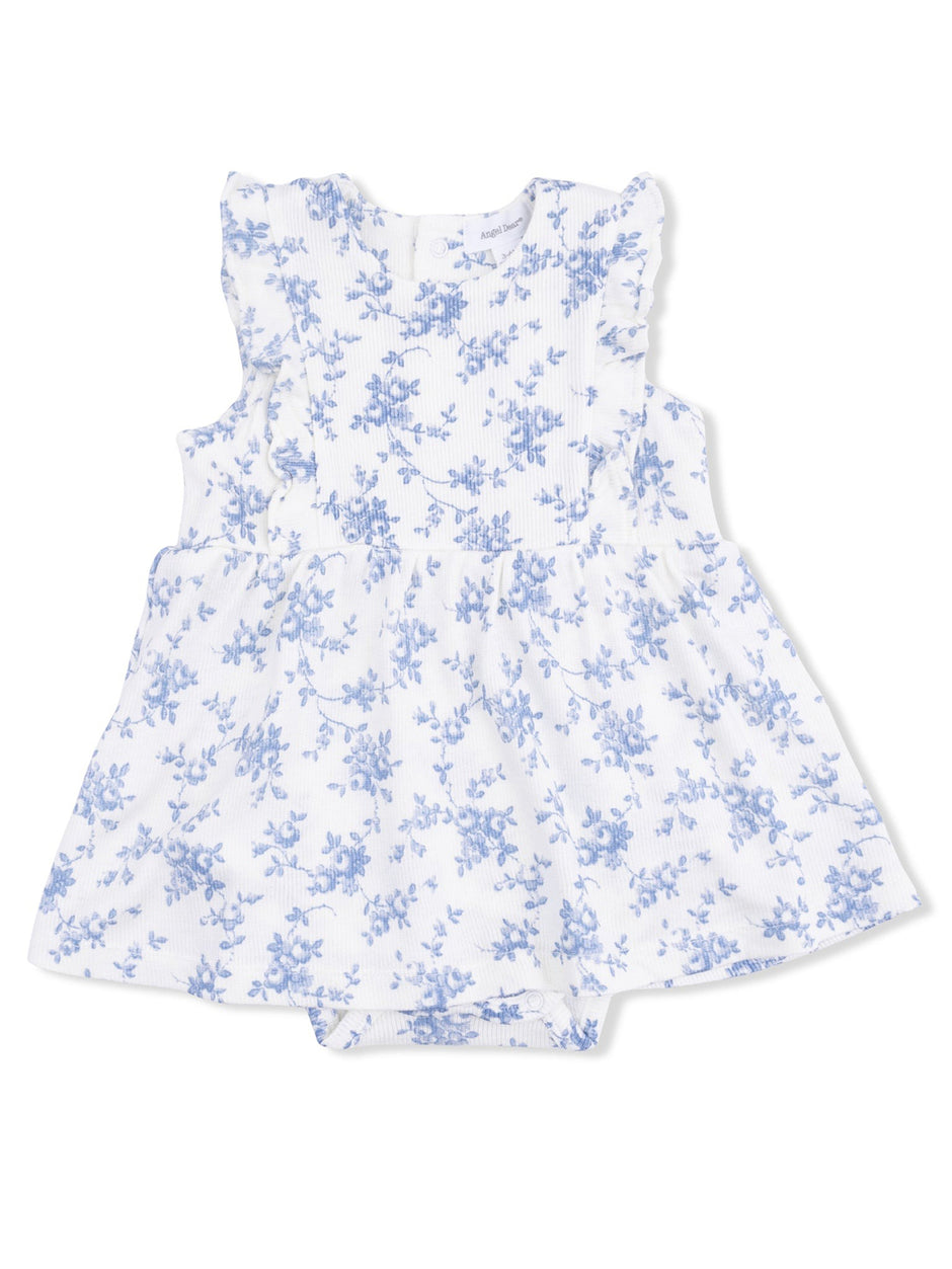 White dress with blue floral pattern and ruffle sleeves, suitable for babies.