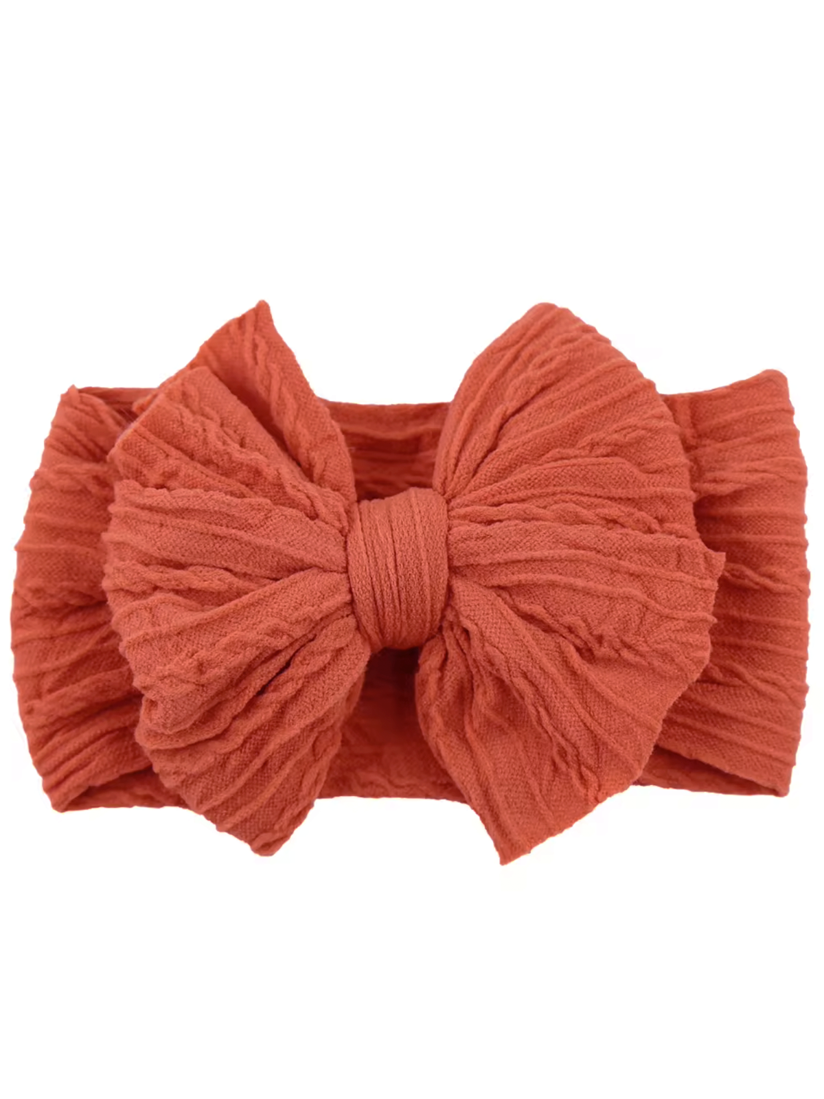 Rust-colored headband with a large textured bow design, perfect for adding a stylish touch to any outfit.