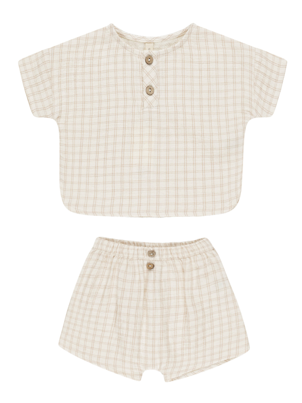 Light beige children's top and shorts set with a grid pattern and button details. Perfect for warm weather.