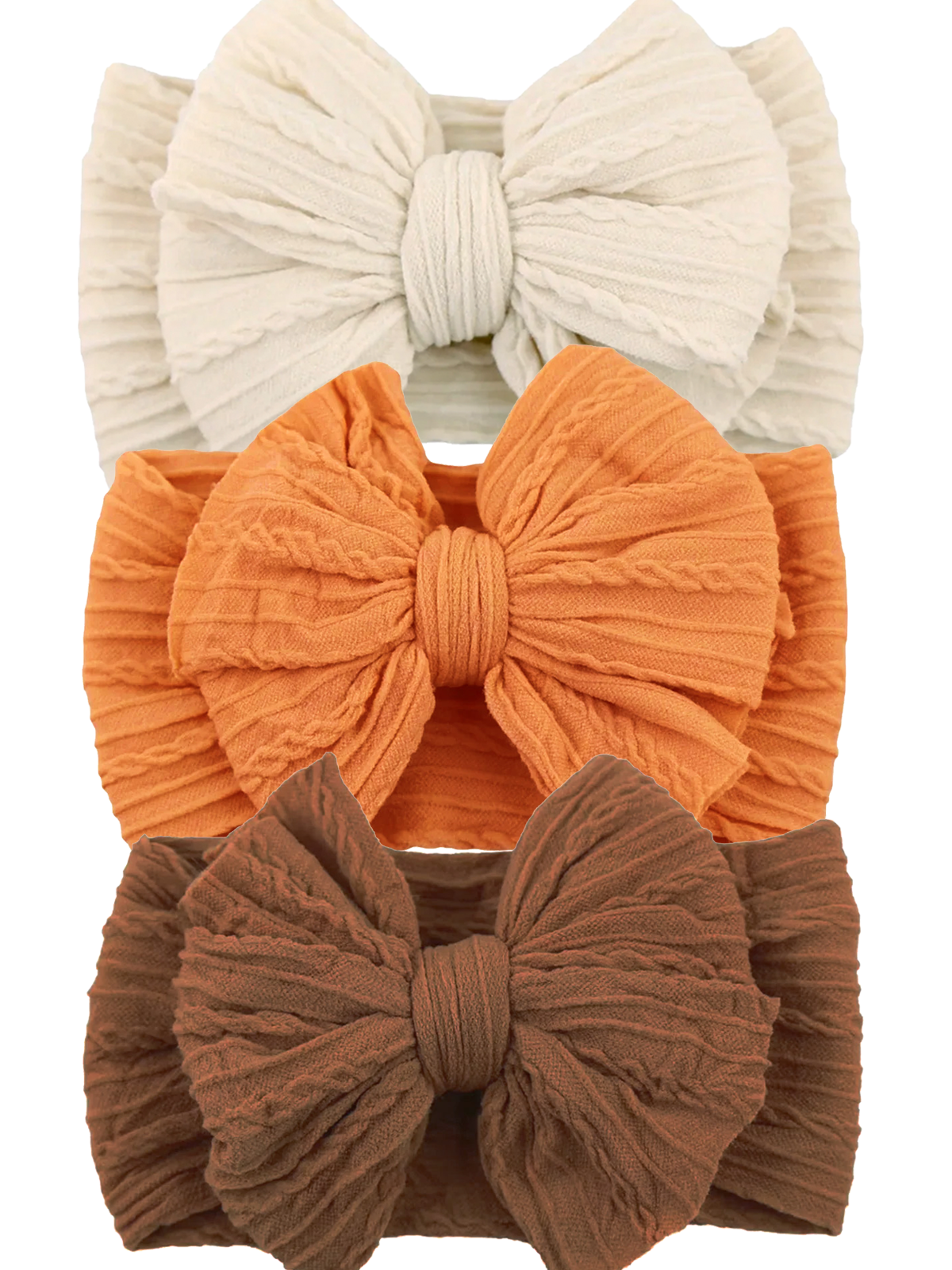 Three textured headbands in cream, orange, and brown, featuring large fabric bows on each band.
