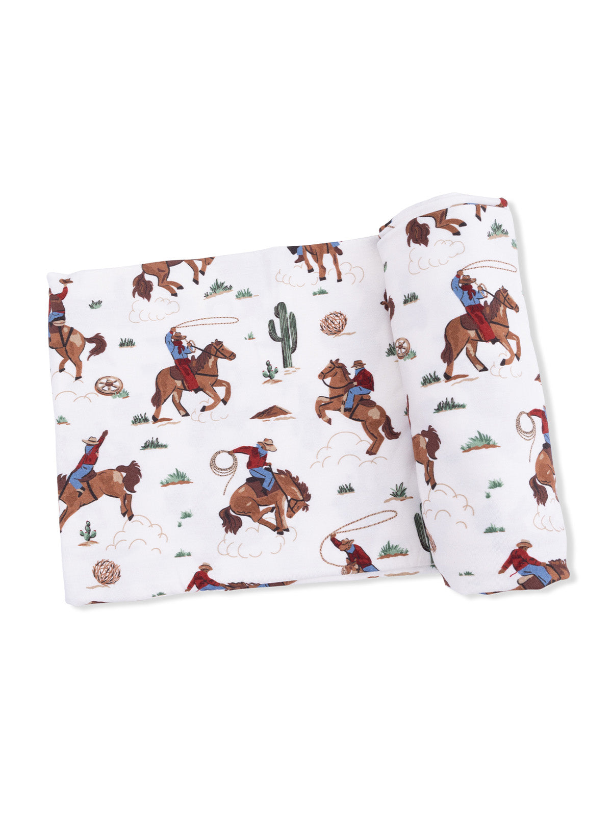 Colorful western-themed fabric featuring cowboys on horses against a light background.