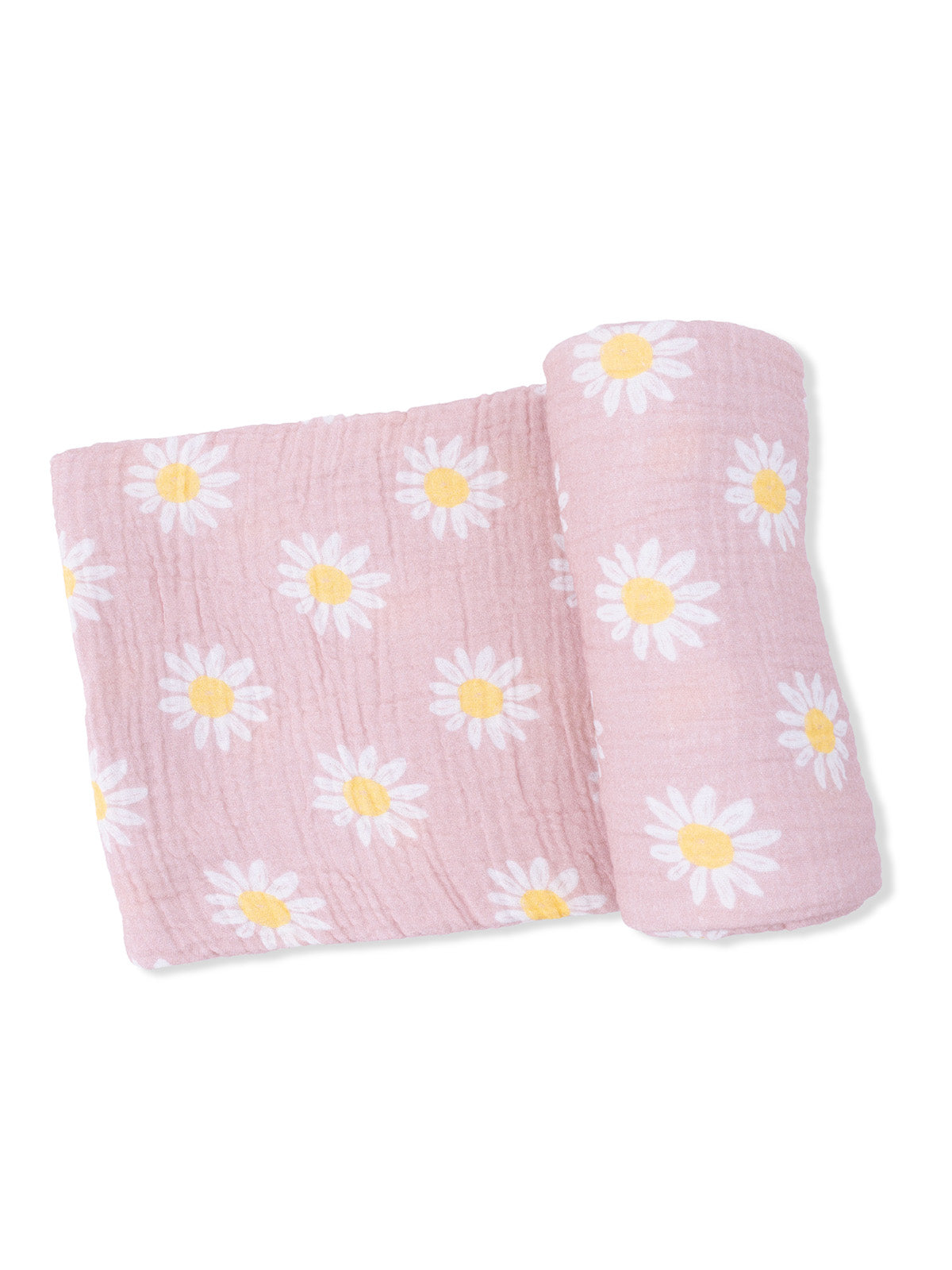 Pink blanket with white daisies and yellow centers, folded with a rolled edge. Soft, textured fabric.