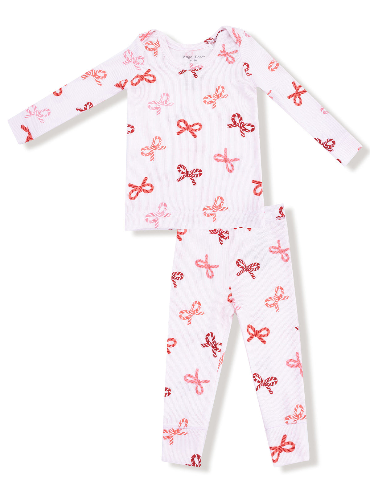 White pajama set featuring red and pink bow patterns, including a long-sleeve top and matching pants.