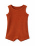 Orange ribbed baby romper with sleeveless design and snap buttons at the bottom.